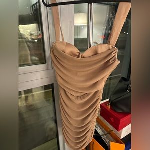 Sexy brown sleeveless dress.